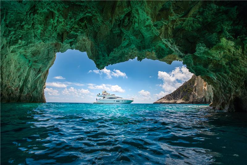 Manu Motor Yacht based in Zakynthos, Greece, a fantastic local crew of two, the ideal yacht for island-hopping and cruising inside the caves - High Point Yachting