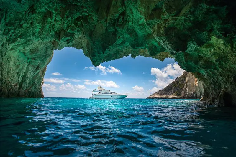 Manu Motor Yacht based in Zakynthos, Greece, a fantastic local crew of two, the ideal yacht for island-hopping and cruising inside the caves - High Point Yachting