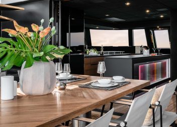 catamaran yacht charter E Supercat dining