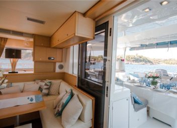 luxury_charter_catamaran_lucky_clover_saloon_aft_deck_walk_through