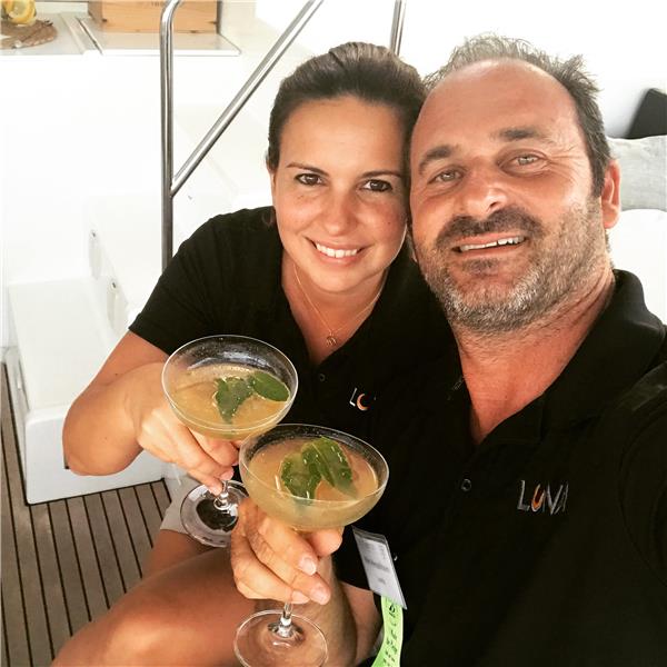 Crew with award winning cocktail on yacht charter - High Point Yachting