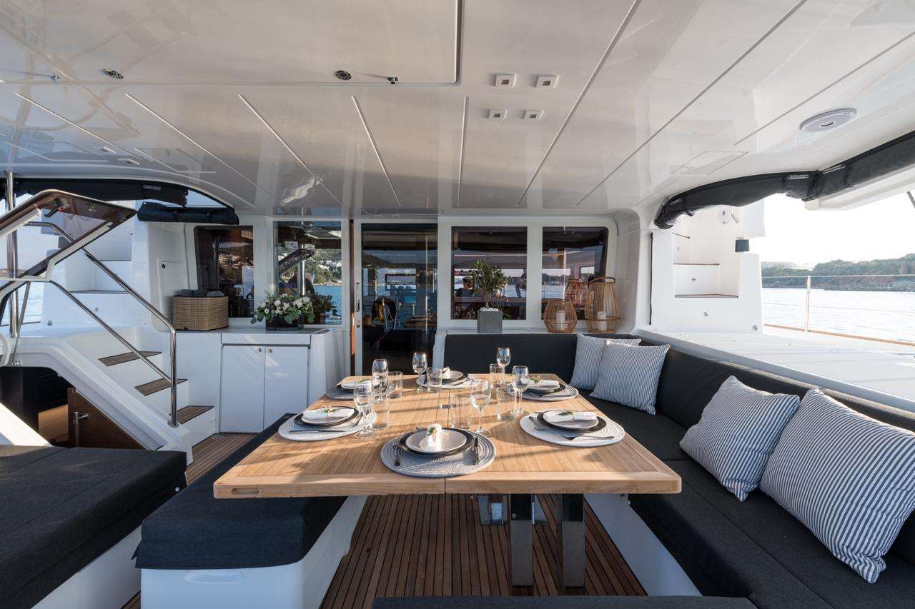 Nomad Lagoon 52 catamaran charter provides a contemporary and luxurious feel with stylish interior & outdoor furnishing - High Point Yachting