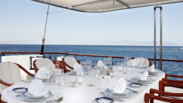 Iraklis luxurious motorsailer classic wooden yacht outdoor dining area- High Point yachting