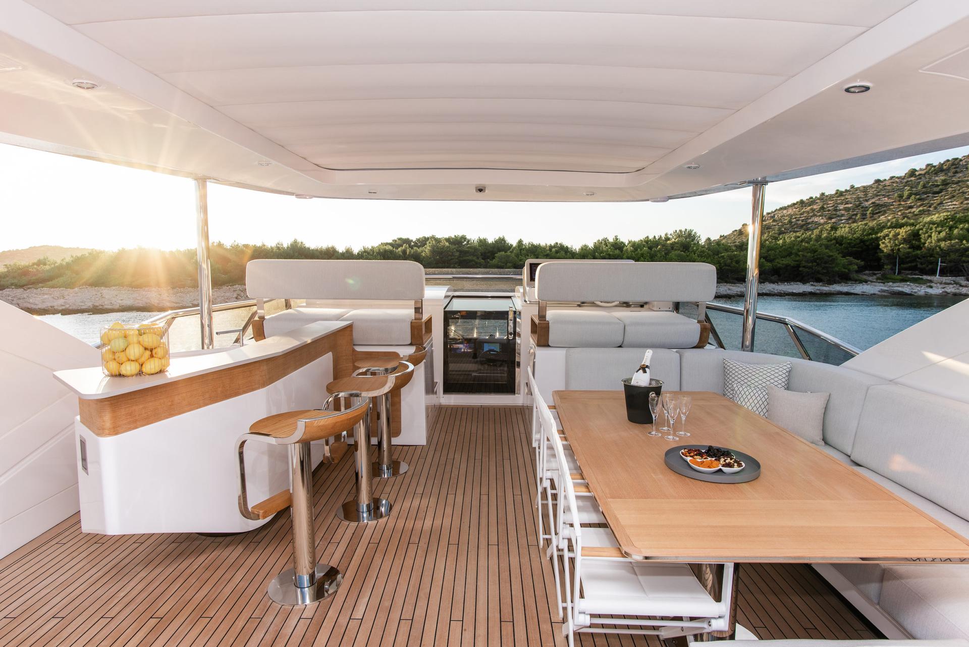 Dawo brand new 27m Azimut yacht charter in Croatia from UK & USA Flybridge with Bar and lunch area - High Point Yachting