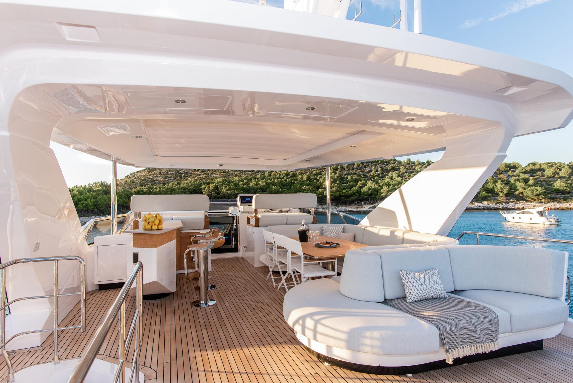 Dawo brand new 27m Azimut yacht charter in Croatia from UK & USA Flybridge with Bar and lunch area - High Point Yachting