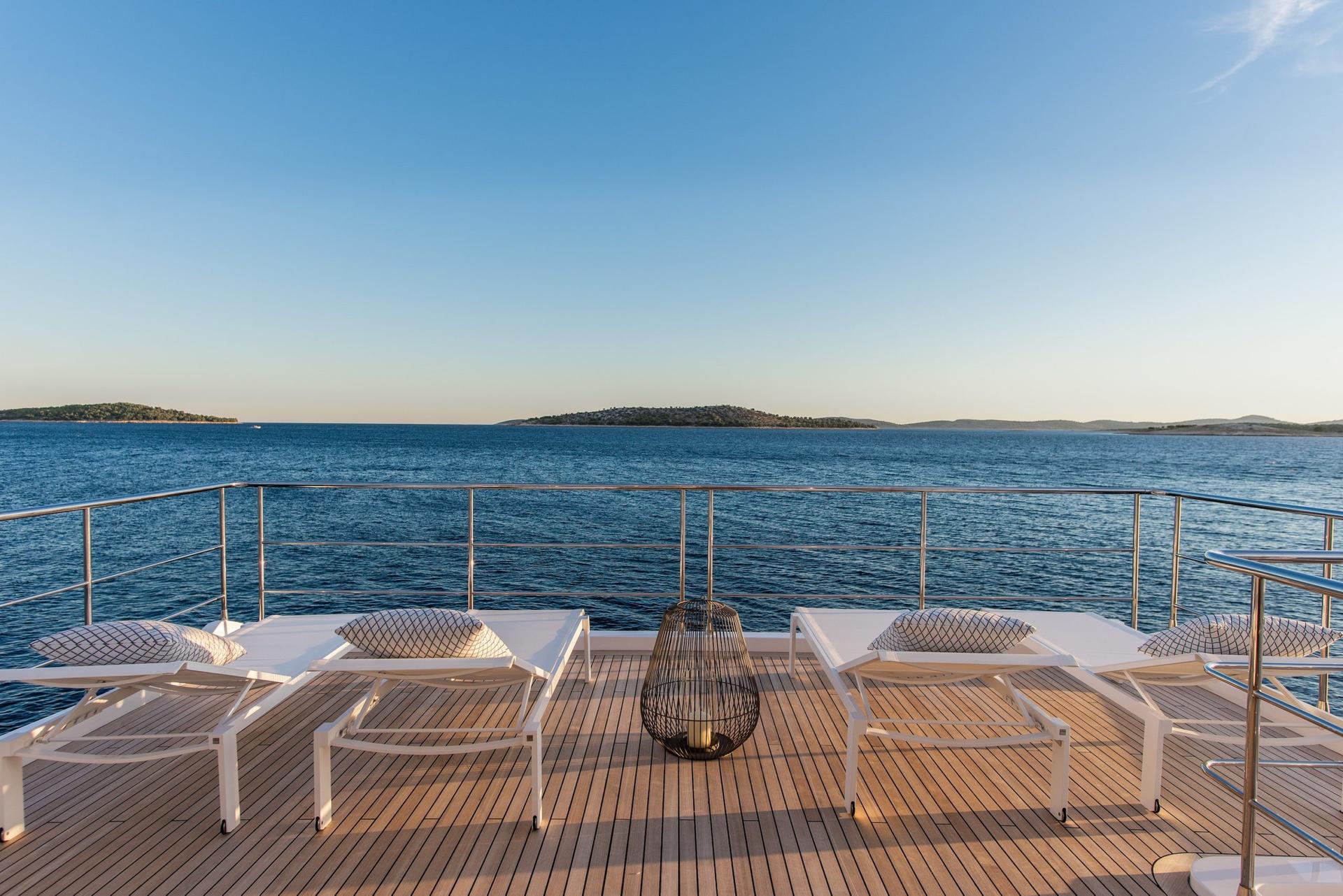 Dawo brand new 27m Azimut yacht charter in Croatia from UK & USA Flybridge sunbathing area - High Point Yachting