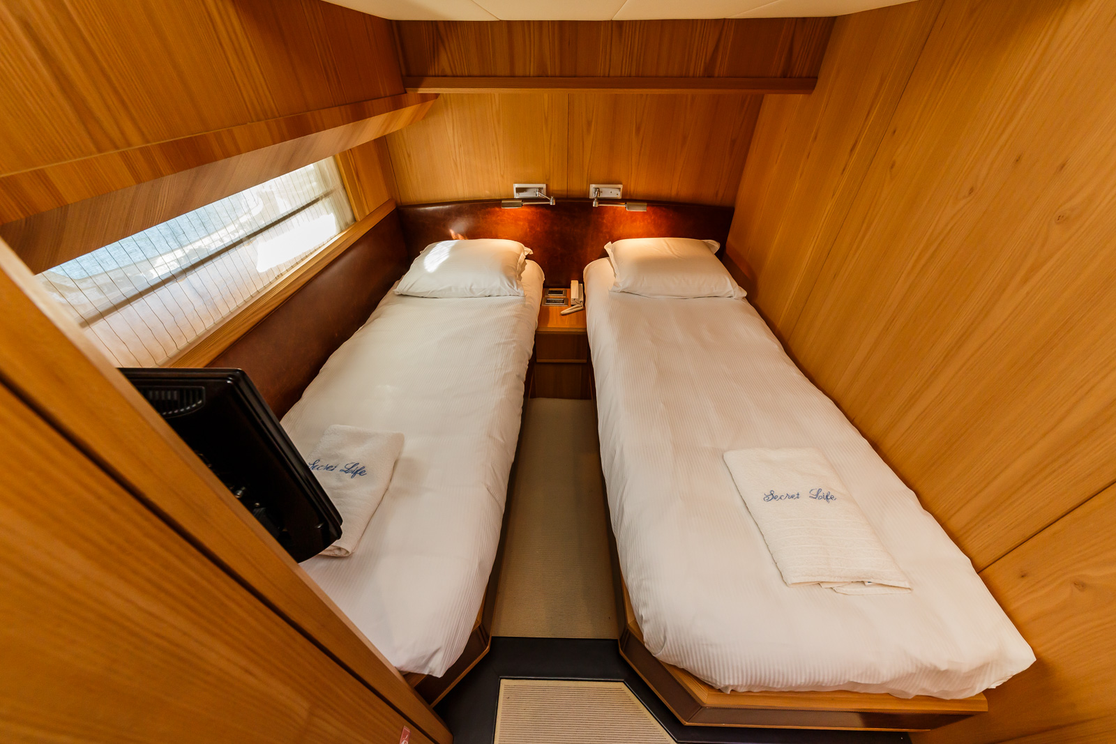 Secret Life Crewed Charter luxury indoor cabin for high-speed travel - High Point Yachting