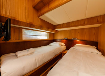 Secret Life Crewed Charter luxury indoor cabin for high-speed travel - High Point Yachting