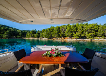 Secret Life Crewed Charter outdoor Lunch area on board - High Point Yachting