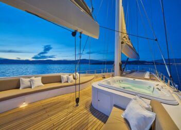 Acapella sailing yacht at night
