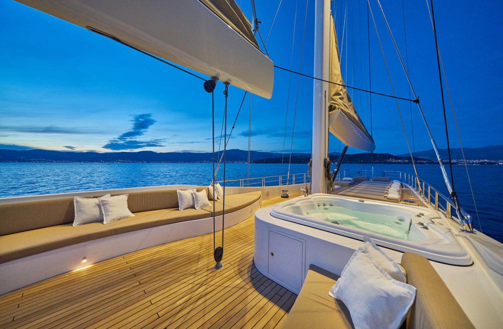 Acapella sailing yacht at night