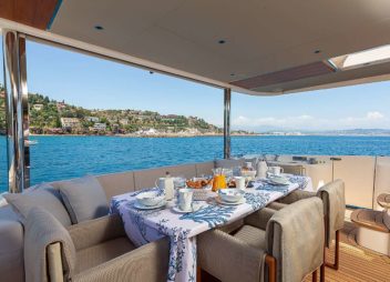 Charter Enigma in Italy, Sardina, Corsica & French a luxury modern yacht fine dining with sea view on yacht- High Point Yachting