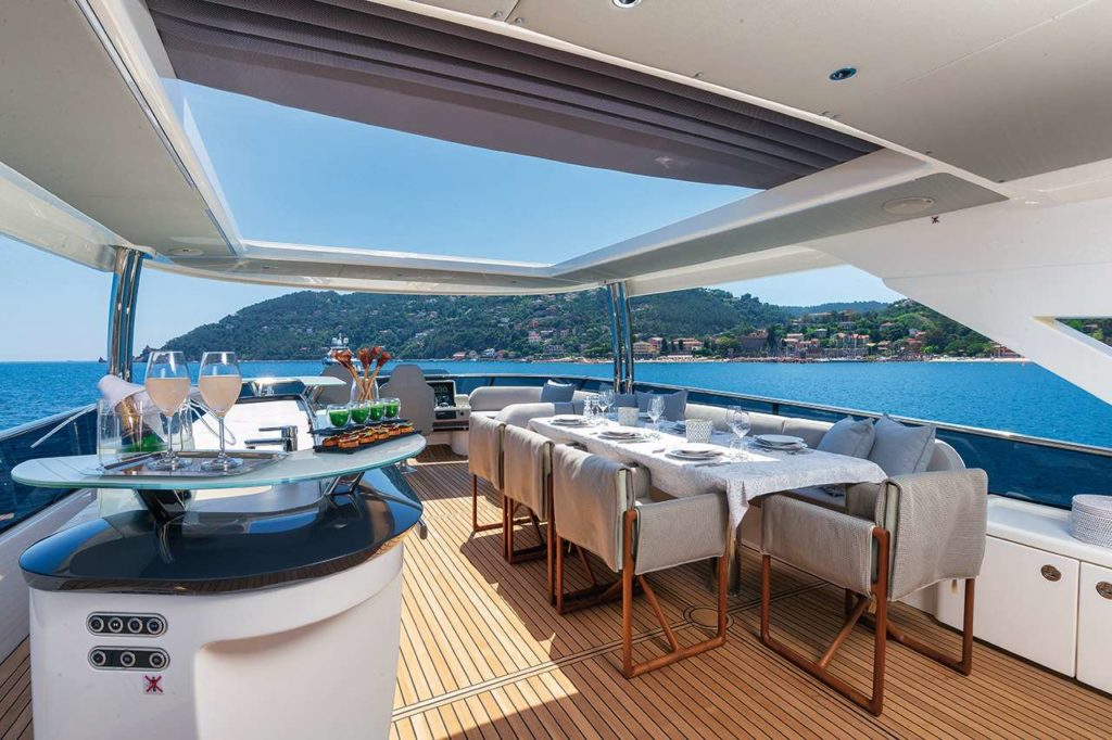 Charter Enigma in Italy, Sardina, Corsica & French a luxury modern yacht fine dining with sea view on yacht- High Point Yachting