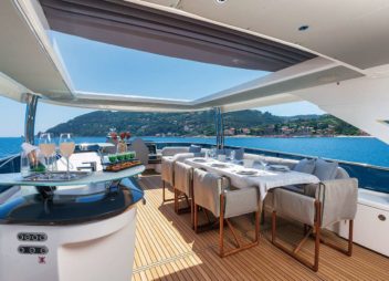 Charter Enigma in Italy, Sardina, Corsica & French a luxury modern yacht fine dining with sea view on yacht- High Point Yachting