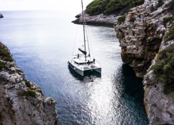 Sailing catamaran Marla in a bay