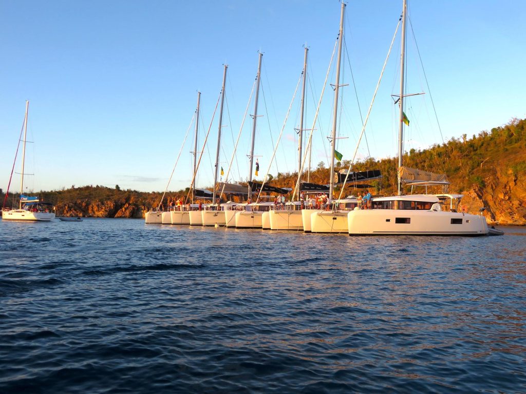 HPYF 2019 caribbean  catamaran fleet anchored at Norman Island, in the BVI, Caribbean - High Point Yachting